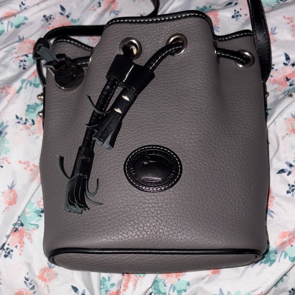 Dooney & Bourke Handbags - Dooney & Bourke Grey Pebbled Leather Drawstring Crossbody BagNWOT